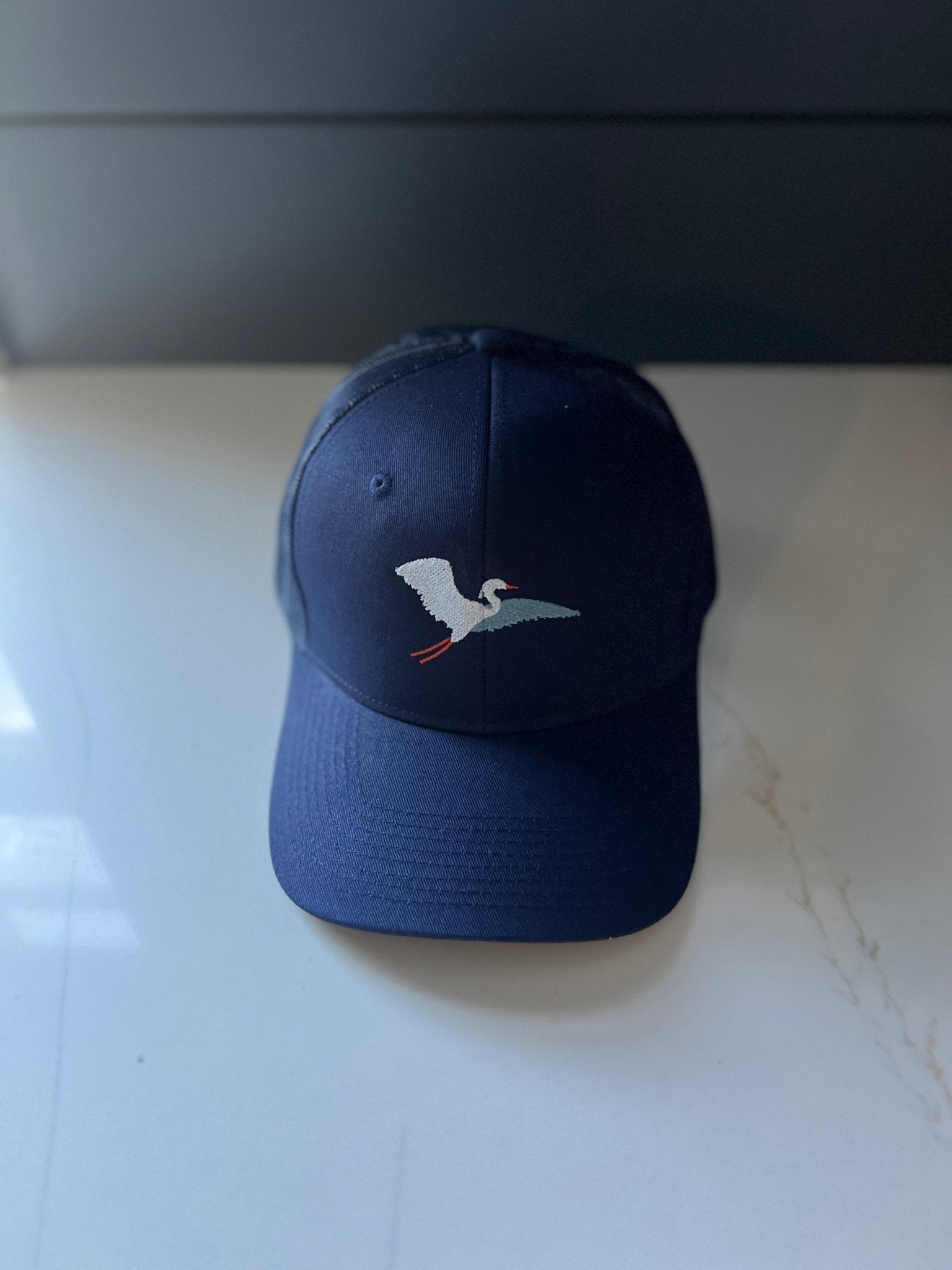 NAVY HERON TRUCKER HAT - Gray Heron